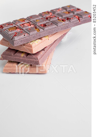 Chokolate bar - raw dessert with berries on white background 85203452