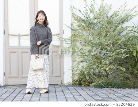 Cute woman going out 85204629