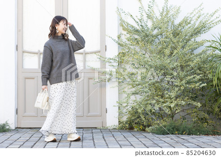 Cute woman going out 85204630