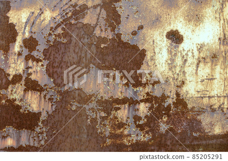 Old cracked abstract grunge vintage texture copy space sunny background, retro pattern. White irregular spots paint peeling of brown concrete or wooden wall or ceiling flat surface. 85205291