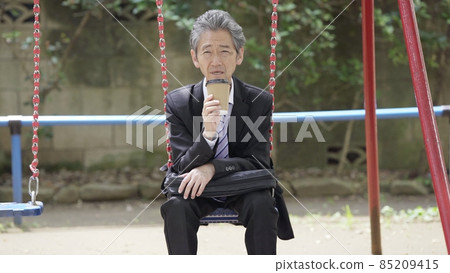 A lonely park where businessmen are worried A lonely park where businessmen are worried 85209415