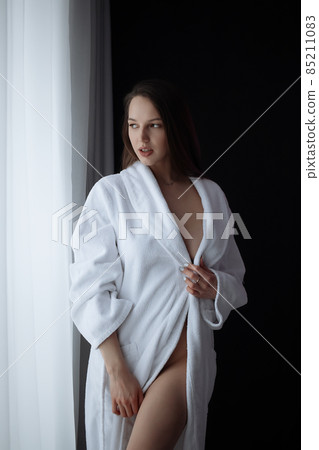 Topless sensual woman at home 85211083