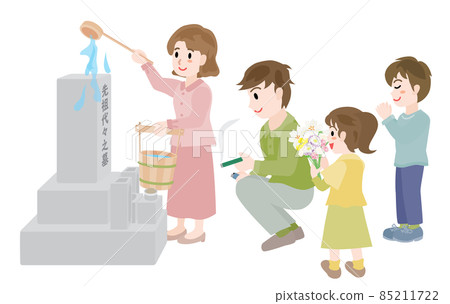A family of four visiting a grave on the equinoctial week in spring 85211722