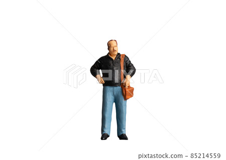 Miniature people Old man holding a shoulder bag standing on white background with clipping path Miniature people Old man holding a shoulder bag standing on white background with clipping path 85214559