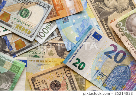 Colorful abstract background of different banknotes., Ukrainian national currency bills, American dollars and euro. Money and finances, succesful investment concept. 85214858