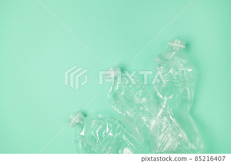 Many used plastic bottles background, top view. Recycling problem. Top view, copy space. 85216407