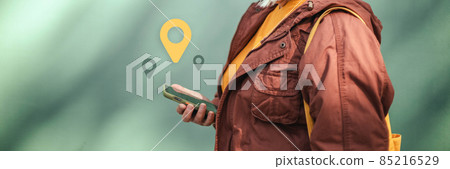 Woman using smart phone with navigation app at city street Woman using smart phone with navigation app at city street 85216529