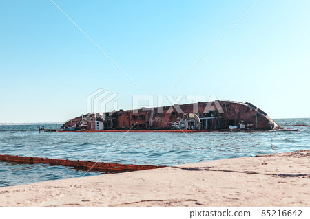 Tanker sunken in a storm near the coast of Odessa, Ukraine. Ship aground near the beach. Tanker sunken in a storm near the coast of Odessa, Ukraine. Ship aground near the beach. 85216642
