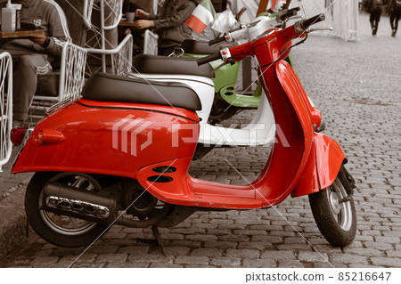 Two Scooter parked on old street. Rent. Urban transportation for every day. Two Scooter parked on old street. Rent. Urban transportation for every day. 85216647