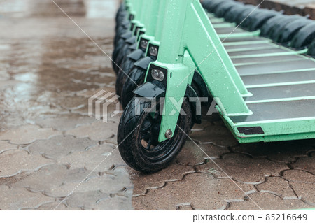 Rental electric scooter economic vehicle in the city for every day. City bike rental system 85216649