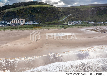 Aerial view of Downhill beach at County Antrim coastline - Northern Ireland Aerial view of Downhill beach at County Antrim coastline - Northern Ireland 85219082