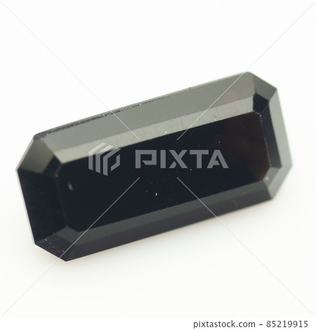 Natural black quartz morion on the white background 85219915