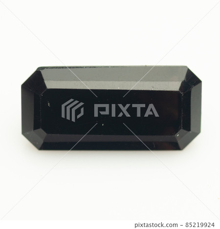 Natural black quartz morion on the white background 85219924