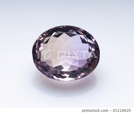 Natural bicolor ametrine on the white background 85220620