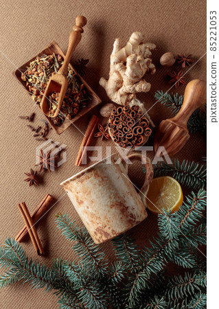 Mug and ingredients for making a winter hot drink. 85221053