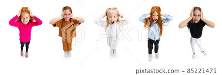 Collage of cute girls, children having hands to ears isolated over white background 85221471