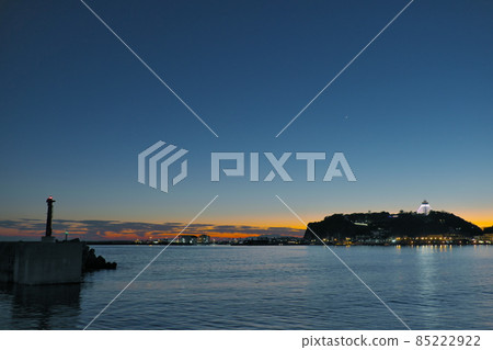 Magic hour in Shonan - Enoshima as seen from Koshigoe Fishing Port Magic hour in Shonan - Enoshima as seen from Koshigoe Fishing Port 85222922