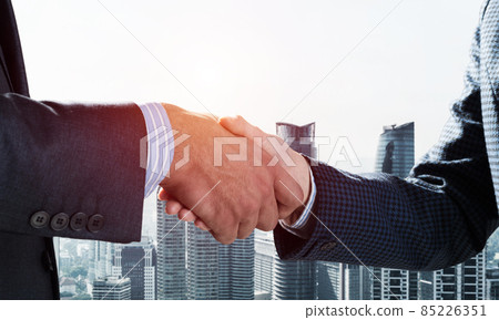 Close-up of the handshake of businessmen. 85226351