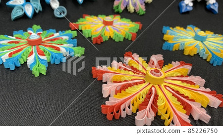 Multicolored paper crafts with flowers using the quilling technique Multicolored paper crafts with flowers using the quilling technique 85226750