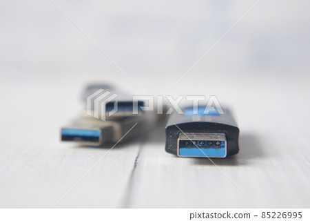 USB flash drive on pink background close up  85226995