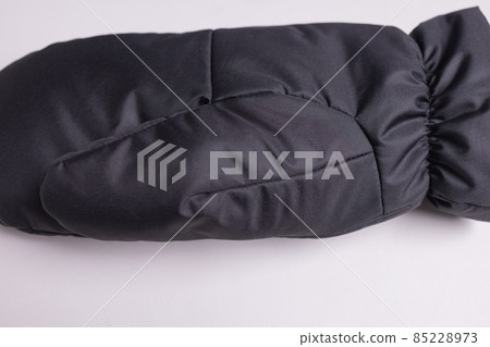 Winter knitted woolen gloves on isolated white background. Winter knitted woolen gloves on isolated white background. 85228973