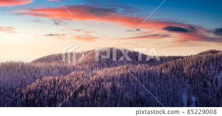 Aerial Panoramic View of Canadian Mountain covered in snow. Aerial Panoramic View of Canadian Mountain covered in snow. 85229008