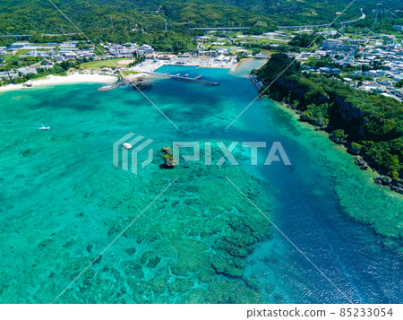 [Okinawa / Aerial] Aerial view of Onna fishing port in Onna village, Okinawa ① 85233054