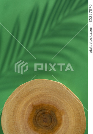 Podium and green background for product photography 85237076