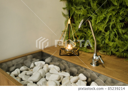 taps with drinking water in the interior of the fitness club 85239214