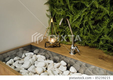 taps with drinking water in the interior of the fitness club 85239215