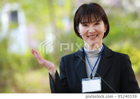 Image of a smiling female employee Image of a smiling female employee 85240339
