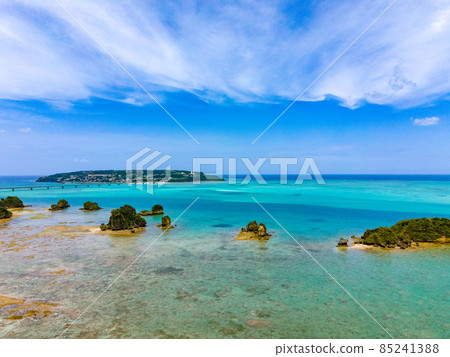 [Okinawa / Aerial] Aerial view of Kouri Island from Yagaji Fishing Port, Okinawa Prefecture ① 85241388