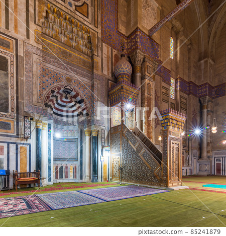 Engraved decorated marble Mihrab and wooden Minbar, at public historical Al Rifaii Mosque, Royal Mosque, Cairo, Egypt Engraved decorated marble Mihrab and wooden Minbar, at public historical Al Rifaii Mosque, Royal Mosque, Cairo, Egypt 85241879