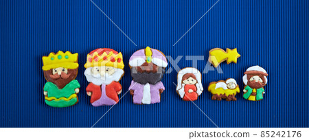 Happy Epiiphany day. Homemade cookies in the shape of the three wise men and Holy family. 85242176