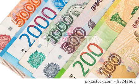 Close-up of banknotes. Five thousand, five hundred, ten thousand, lead and one hundred rubles. 85242663