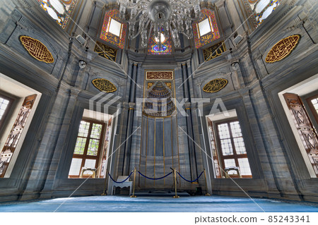 Interior of Nuruosmaniye Mosque showing the Niche (Mihrab), marble wall and stained glass windows, an Ottoman Baroque style mosque, Shemberlitash, Fatih, Istanbul, Turkey 85243341