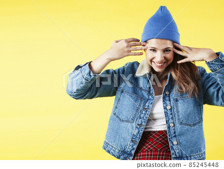 lifestyle people concept: pretty young school teenage girl having fun happy smiling on yellow background 85245448