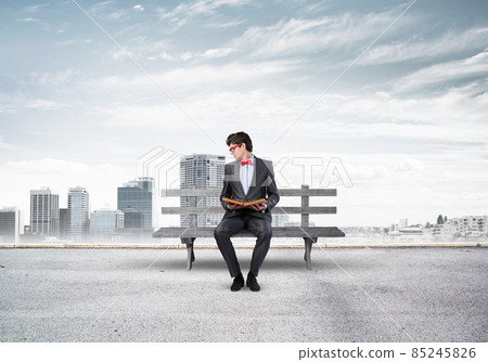 Young student with a book 85245826
