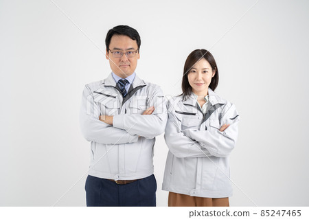 White background of a businessman wearing work clothes for men and women with arms folded White background of a businessman wearing work clothes for men and women with arms folded 85247465