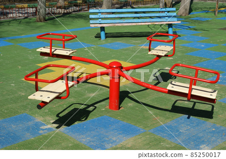 Public playground in a sunny day. Moscow, Russia 85250017