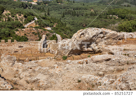 Ancient stone ruins in fortress Angelocastro, Corfu, Greece. 85251727