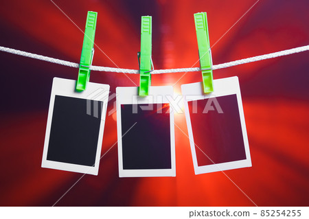 blank photos on red lights background blank photos on red lights background 85254255