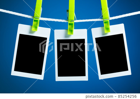 blank photos on blue background blank photos on blue background 85254256