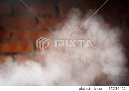 dense smoke against brick wall background dense smoke against brick wall background 85254412