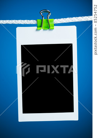 blank photo on blue background blank photo on blue background 85254752