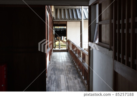 A landscape with a corridor connecting the buildings in a Japanese house A landscape with a corridor connecting the buildings in a Japanese house 85257188