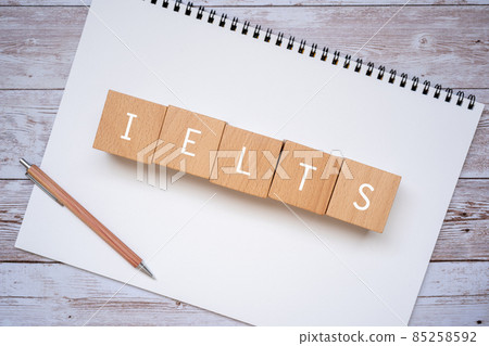 Building blocks, pens and notebooks labeled "IELTS" 85258592