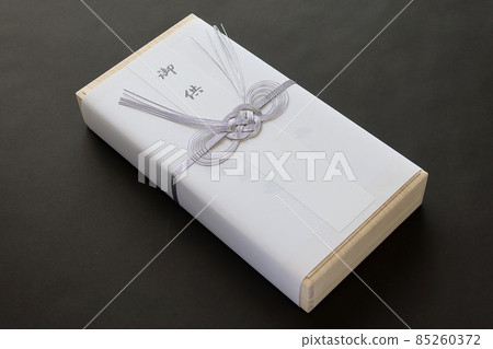 An incense stick for offering in a paulownia box for mourning An incense stick for offering in a paulownia box for mourning 85260372