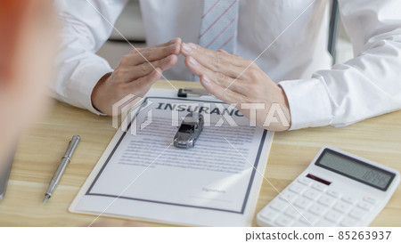 Car insurance, Car dealers or insurance managers cover and protect against damage and the risk of driving, Insurance agent, Protecting and after-sales care concept. Car insurance, Car dealers or insurance managers cover and protect against damage and the risk of driving, Insurance agent, Protecting and after-sales care concept. 85263937