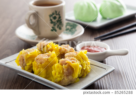Siu Mai - Chinese steamed pork dumplings in bamboo steamers. Dim Sum 85265288